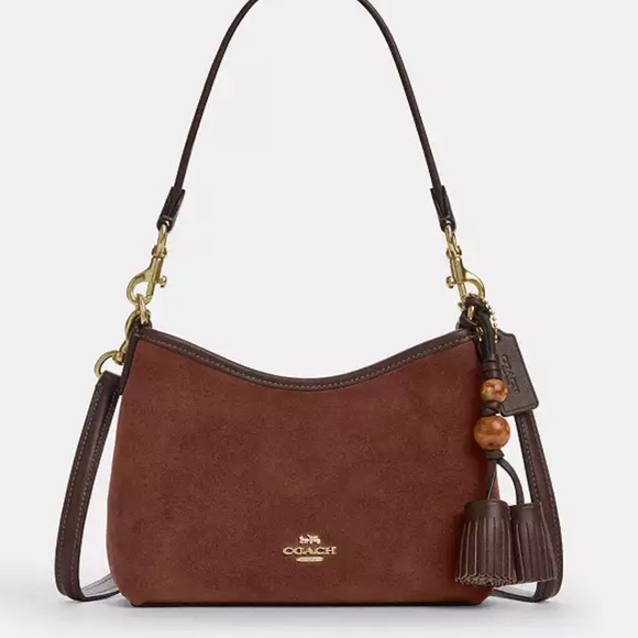 Coach Handbags - Coach Laurel Shoulder Bag With Tassels
PREOWNED/USED